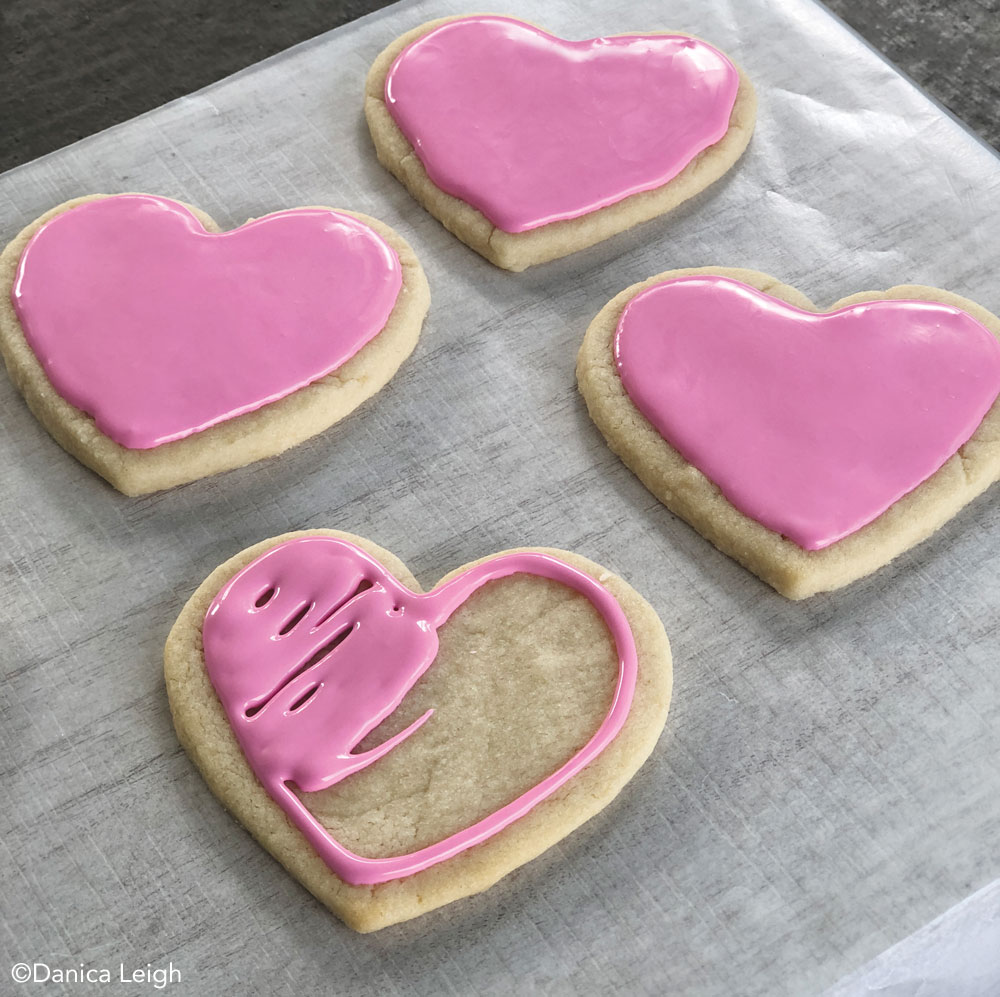 Frosting Valentine's Day cookies